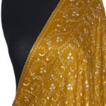A Jaal semi-pashmina shawl draped on a mannequin, featuring an intricate, all-over pattern in various colors on a soft base.