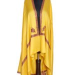A bright goldenrod yellow semi-pashmina shawl with delicate multicolored Kashmiri embroidery draped elegantly on a mannequin, showcasing its detailed borders and soft texture.